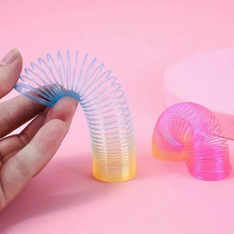 12Pcs Mini Rainbow Magic Springs Toys