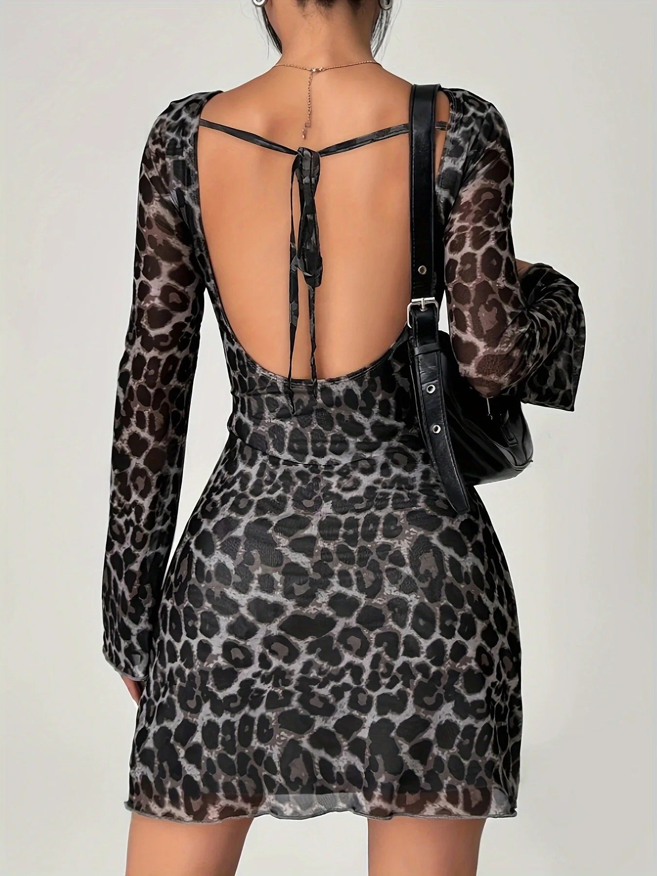 Grey leopard print long sleeved dress with printed backless flared sleeves
